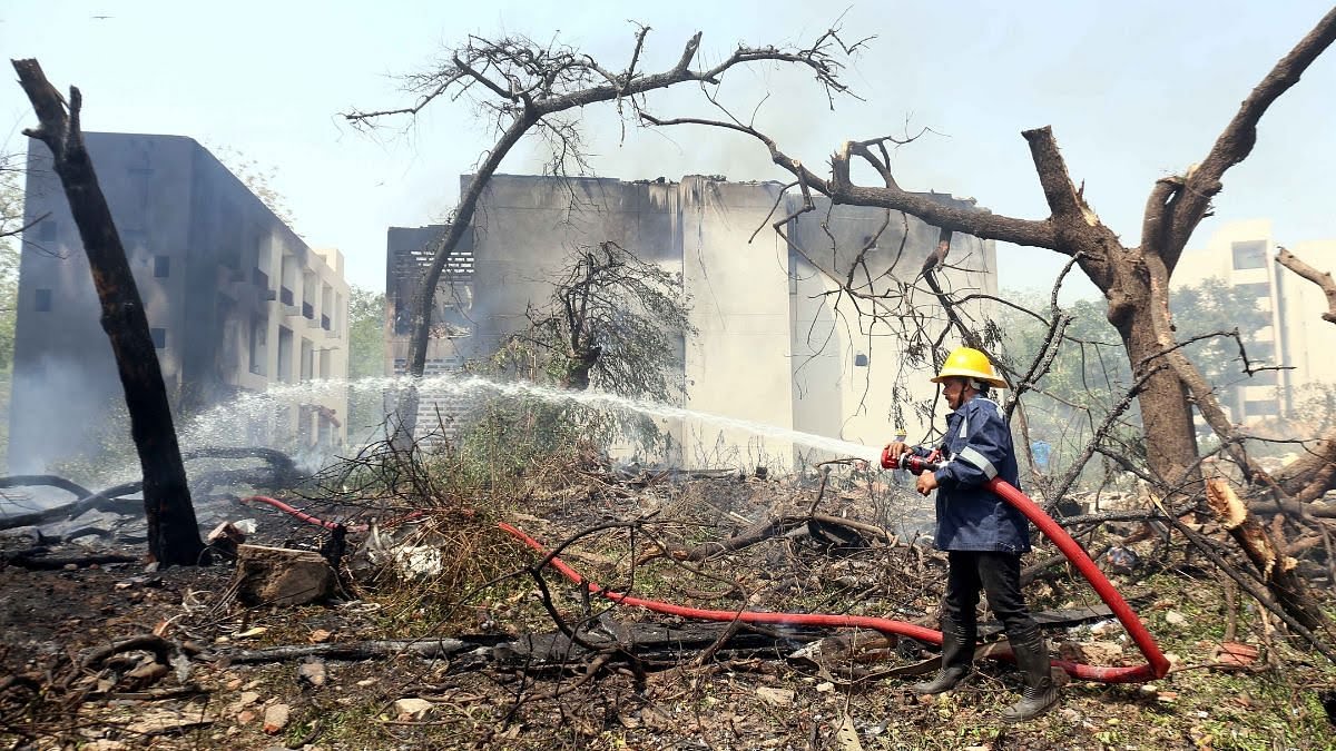 ‘Many killed’ as Air India plane with 242 on board crashes near India’s Ahmedabad airport